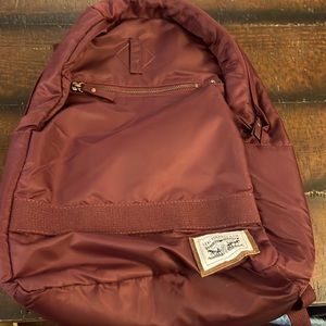 Levi’s Strauss the heritage nylon backpack. Orange inside liner.